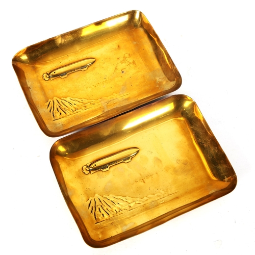 1298 - A pair of WMF Zeppelin design brass dishes, length 20cm