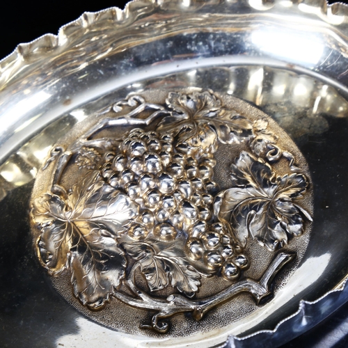 1299 - A Victorian electroplate oval fruit bowl, with relief grapevine centre panel, length 27cm