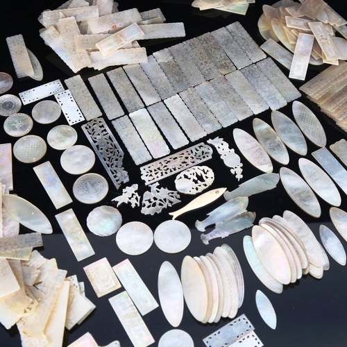 1300 - A large collection of Chinese engraved mother-of-pearl gaming counters