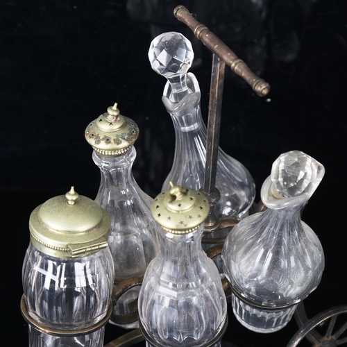 1302 - A Victorian novelty 5-bottle cruet set, modelled as a tricycle, original cut-glass bottles on electr... 