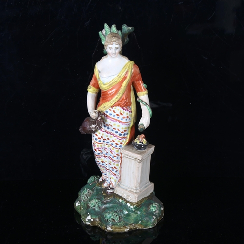 1307 - An early 19th century Staffordshire Pearlware Classical figure, height 24cm