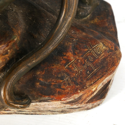 1308 - A bronze patinated pottery tiger on a rock, circa 1930, length approx 38cm, height 30cm