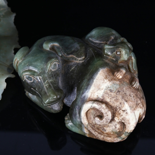 1313 - A large Chinese carved jade cabbage, length 27cm, and a carved stone dog with puppy, length 14cm (2)