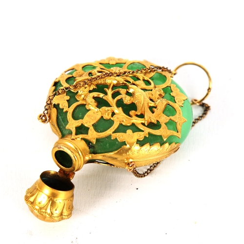 1319 - A 19th century French green glass and unmarked gold overlay perfume flask, with relief cast lovebird... 