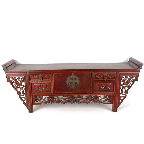 1329 - A Chinese stained wood altar table of small size, with 4 small carved drawers and central cupboard f... 