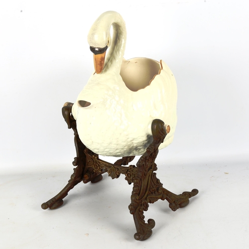 1332 - A 19th century ceramic swan design cistern or punch server, on original gilded cast-iron acanthus sc... 