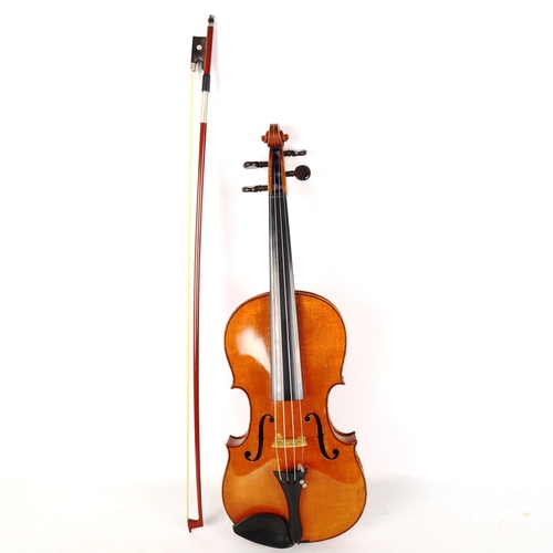 1338 - An early 20th century full-size violin, no labels, length of back 356mm, with unmarked bow in Hill &... 