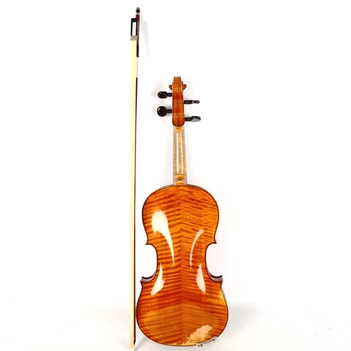 1338 - An early 20th century full-size violin, no labels, length of back 356mm, with unmarked bow in Hill &... 