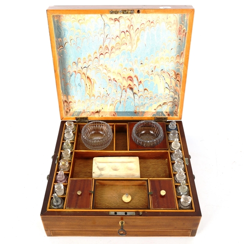 1339 - A 19th century artist's workbox, mahogany with tulip wood crossbanding, the hinged lid with a painte... 