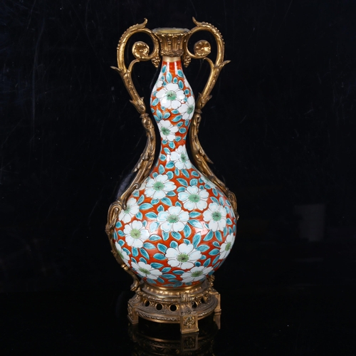 1341 - A Chinese porcelain and ormolu lamp base, with painted floral design, 6 character mark, height 38cm,... 