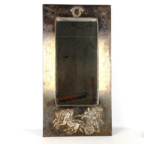 1351 - An anodised metal-framed wall mirror, circa 1920, with relief embossed Roman chariot design, 75cm x ... 