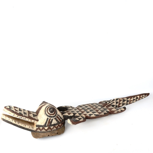 1363 - An African Tribal carved and painted wood crocodile mask, length 116cm