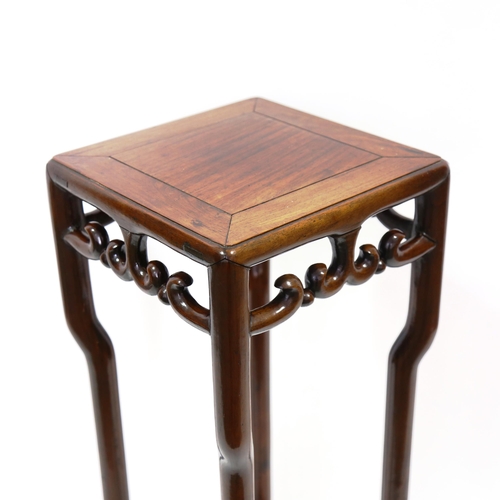 1374 - A tall Chinese hardwood jardiniere stand, with carved frieze, height 96cm, width 30cm