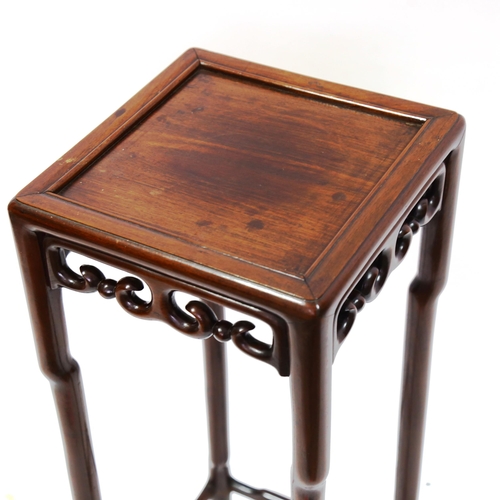 1375 - A Chinese hardwood jardiniere stand, with carved and pierced frieze, height 77cm, width 30cm