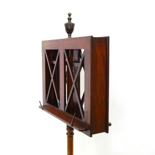 1377 - A William IV mahogany duet music stand, with brass urn finial, bulbous reeded centre column and shap... 