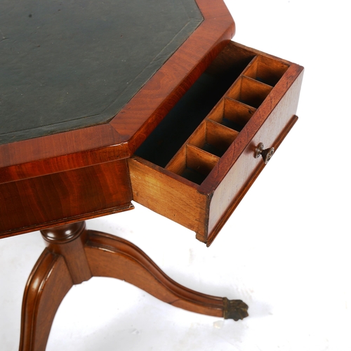 1379 - A Regency octagonal walnut occasional table with inset leather top, 2 frieze drawers and tripod base... 