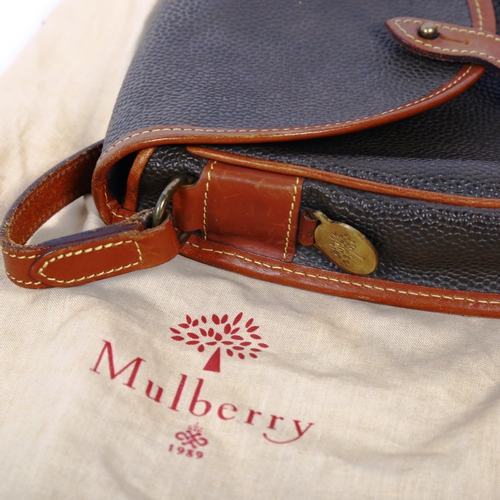 1383 - MULBERRY - an olive/brown leather saddle bag, height approx 22cm, width 18cm, with dust bag