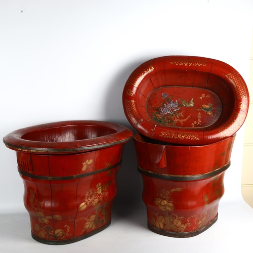 1394 - A pair of Chinese metal-bound red lacquer wood bowls, on separate metal-bound bucket stands, with pa... 