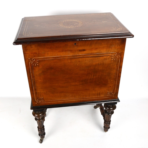 1395 - A Victorian inlaid walnut magazine/music box, with hinged top and turned legs, length 48cm, depth 31... 