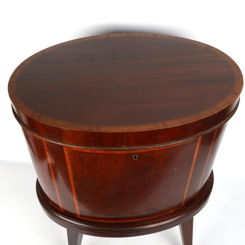 1396 - An Edwardian mahogany and satinwood crossbanded oval wine cooler, on tapered legs, length 53cm, dept... 