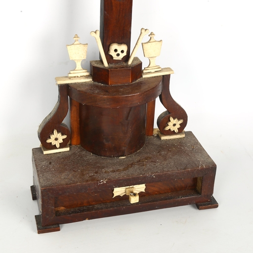 1409 - An 18th century stained wood and bone crucifix, with drawer fitted base, height 73cm