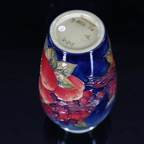 1431 - MOORCROFT POTTERY - a Blue Finches pattern vase, height 18.5cm