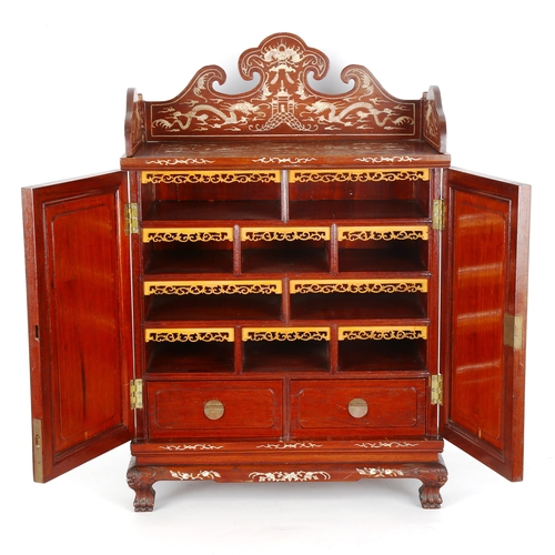 1442 - A Chinese rosewood and ivory marquetry inlaid table cabinet of small size, circa 1990, 2 panelled do... 