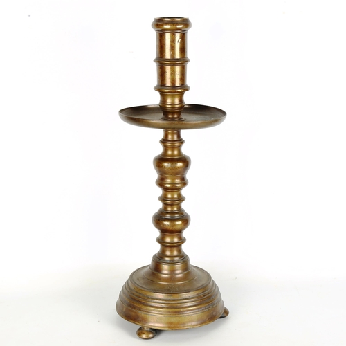 1444 - A heavy 19th century bronze candle stand, height 58cm