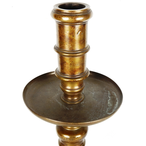 1444 - A heavy 19th century bronze candle stand, height 58cm