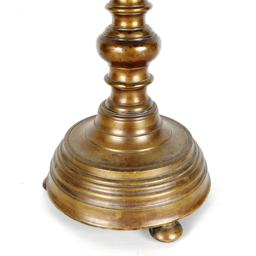 1444 - A heavy 19th century bronze candle stand, height 58cm