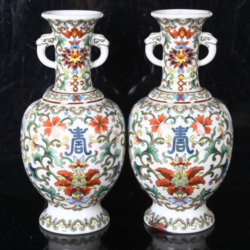 1446 - A pair of Chinese white ground cloisonne enamel vases, detailed multi-colour decoration, height 22cm... 