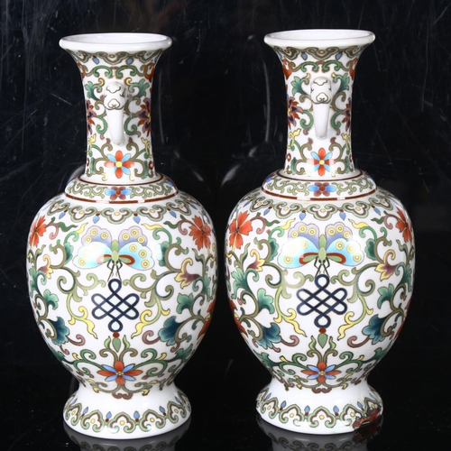 1446 - A pair of Chinese white ground cloisonne enamel vases, detailed multi-colour decoration, height 22cm... 