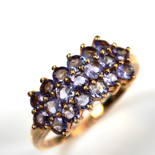 735 - A modern 9ct gold tanzanite cluster ring, set with round-cut tanzanites, setting height 10.1mm, size... 