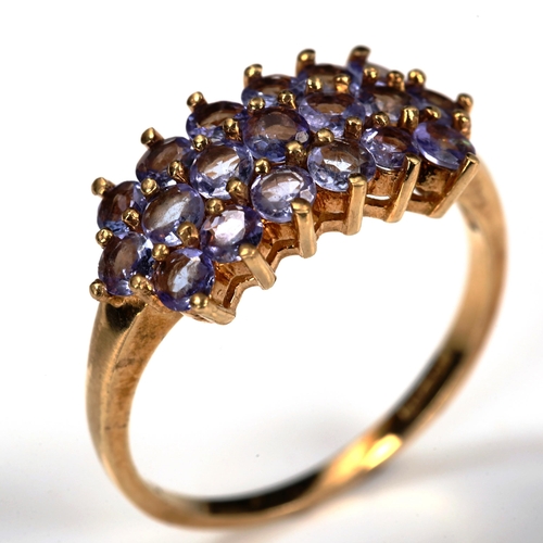 735 - A modern 9ct gold tanzanite cluster ring, set with round-cut tanzanites, setting height 10.1mm, size... 