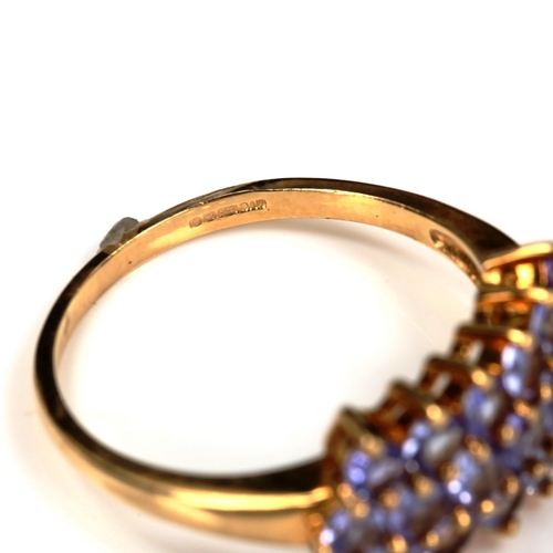 735 - A modern 9ct gold tanzanite cluster ring, set with round-cut tanzanites, setting height 10.1mm, size... 