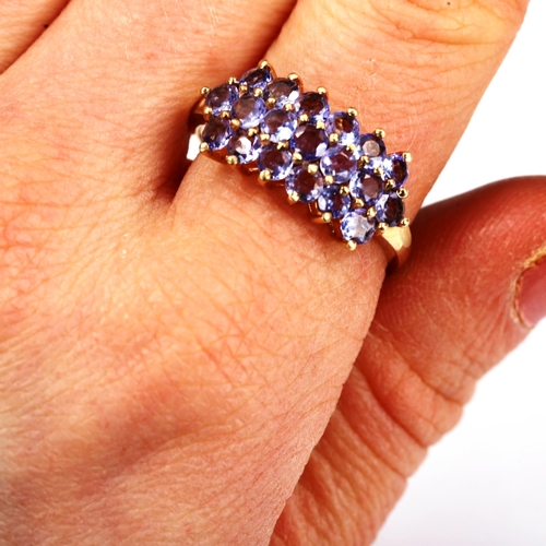 735 - A modern 9ct gold tanzanite cluster ring, set with round-cut tanzanites, setting height 10.1mm, size... 