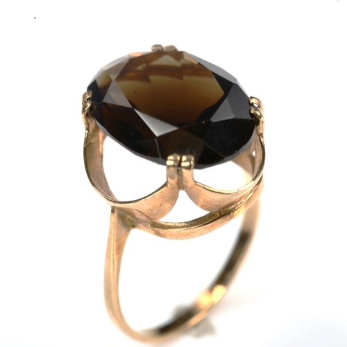 741 - A Continental unmarked gold smoky quartz dress ring, setting height 17.8mm, size M, 3.6g