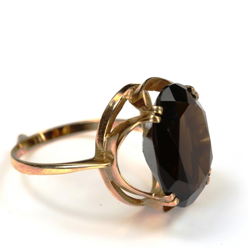 741 - A Continental unmarked gold smoky quartz dress ring, setting height 17.8mm, size M, 3.6g