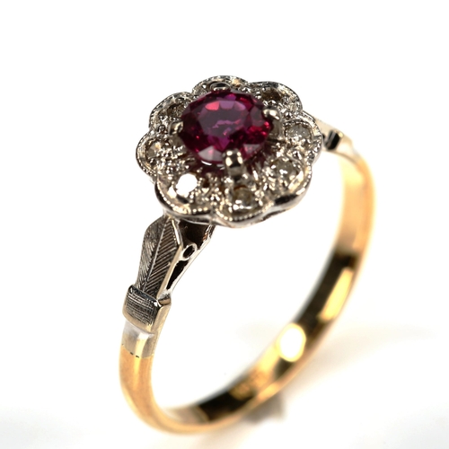 742 - An 18ct gold ruby and diamond cluster ring, set with round-cut ruby and single-cut diamonds, setting... 