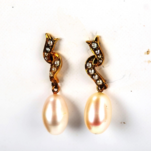 743 - A pair of unmarked gold pearl drop earrings, earring height 30.7mm, 4.3g