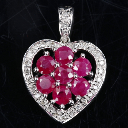 744 - A modern 9ct white gold ruby and diamond cluster heart pendant, pendant height 23.1mm, 2.5g