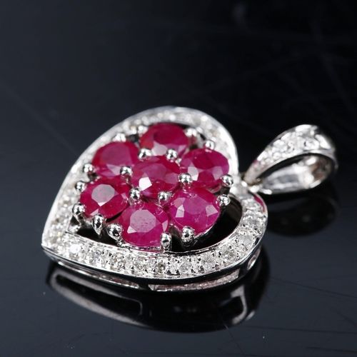 744 - A modern 9ct white gold ruby and diamond cluster heart pendant, pendant height 23.1mm, 2.5g