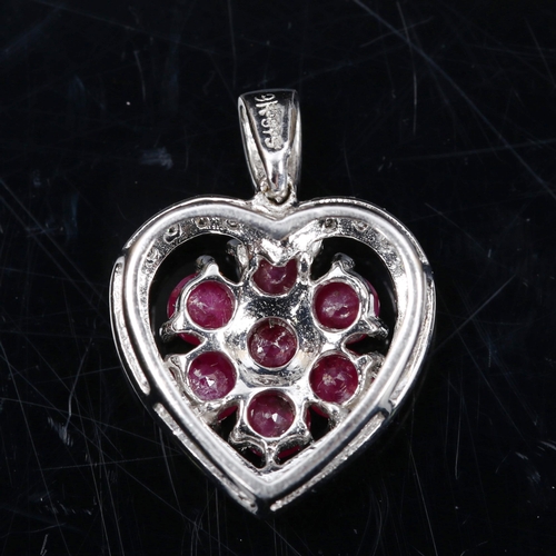 744 - A modern 9ct white gold ruby and diamond cluster heart pendant, pendant height 23.1mm, 2.5g