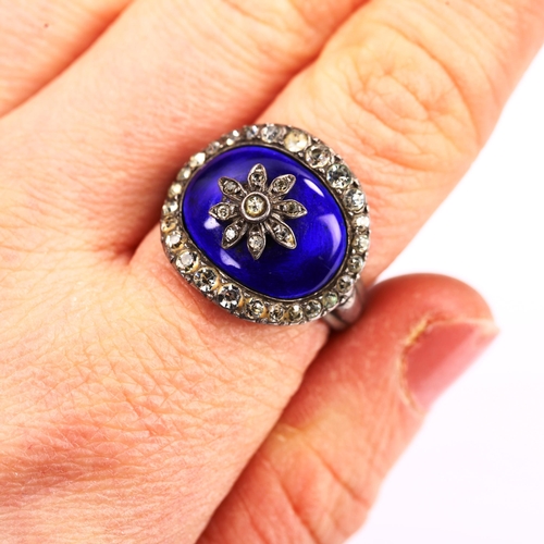 746 - A Georgian blue enamel and paste ring, unmarked white metal settings, 18.6mm, size P, 10.1g