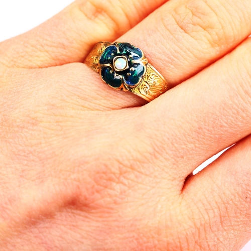 748 - An Antique opal and enamel clover ring, unmarked gold settings with floral engraved shoulders, setti... 