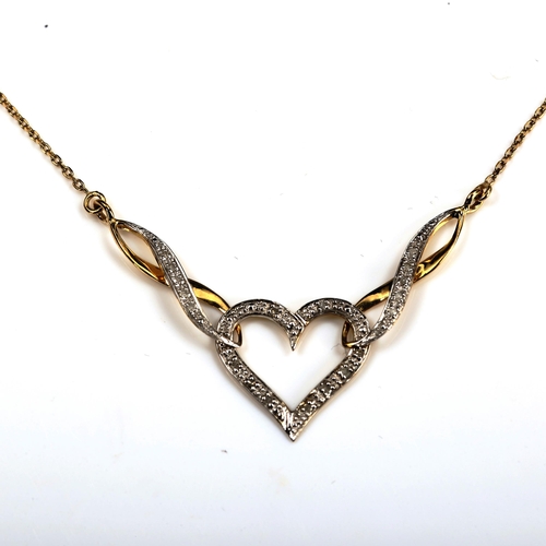 749 - A modern 9ct gold diamond heart necklace, length 42cm, 2.6g