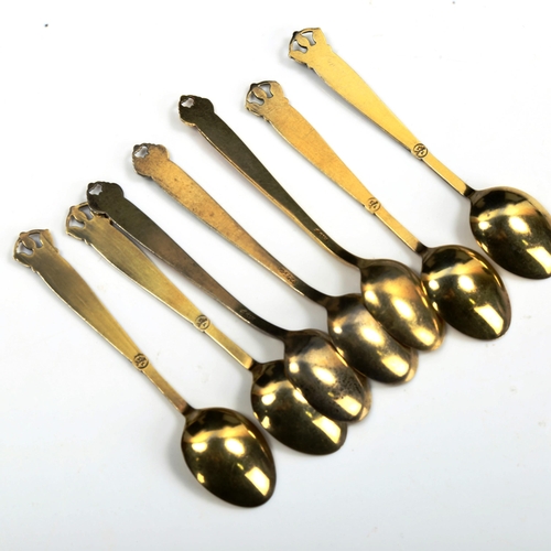 751 - A set of 7 Norwegian vermeil sterling silver and harlequin enamel coffee spoons, length 10cm