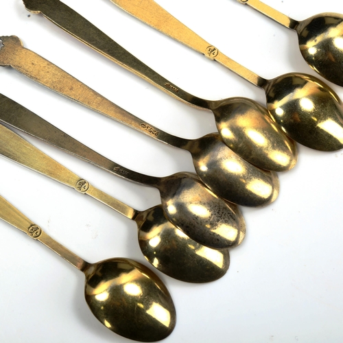 751 - A set of 7 Norwegian vermeil sterling silver and harlequin enamel coffee spoons, length 10cm