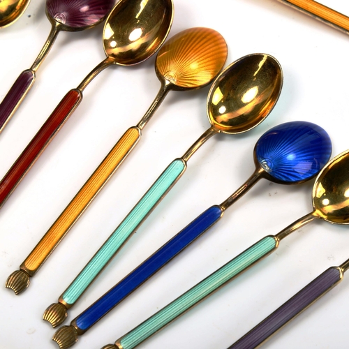 753 - ANTON MICHELSEN - a set of 10 Danish vermeil sterling silver and harlequin enamel coffee spoons, len... 