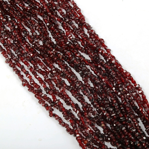 754 - A 10-strand garnet bead necklace, length 44cm, 120g